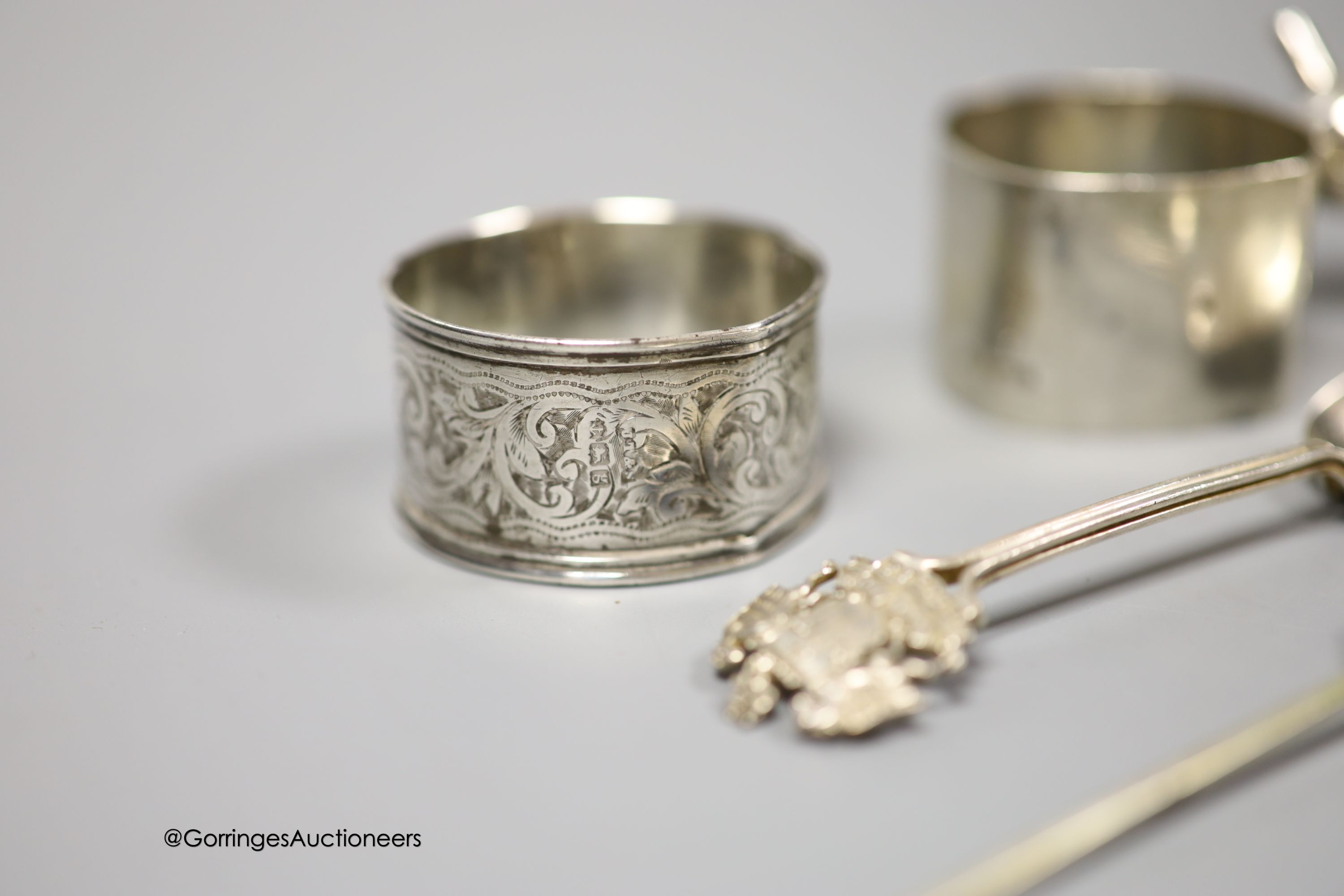 Minor small silver including teaspoons, butter knife, napkin rings etc. and four silver plated items